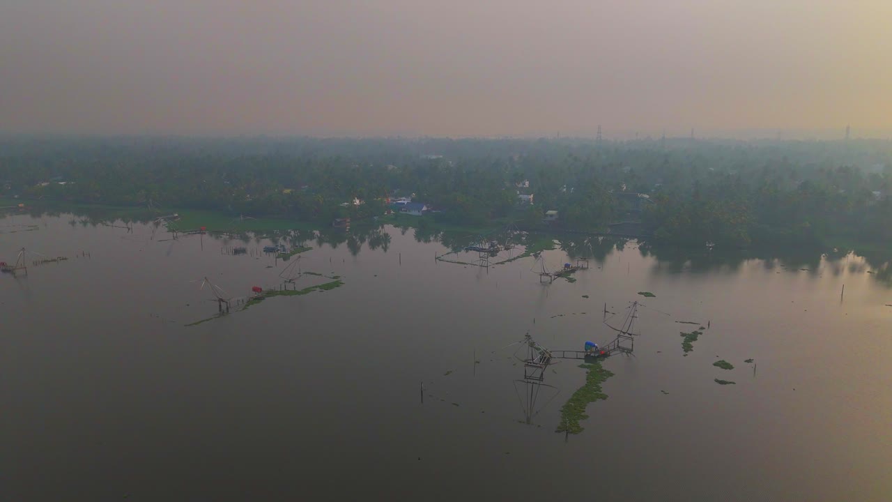 Kerala travel and tourism background, Beautiful sunrise scene of Kerala backwaters with small traditional boat, Tropical river view with morning sunlight through palm trees