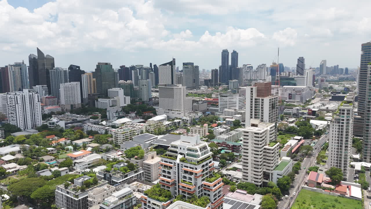 Aerial glimpse of Bangkok’s breathing city—green and concrete intertwined.
