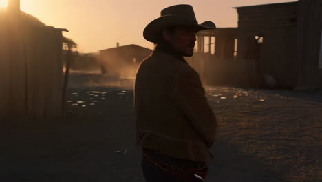 cowboy in a western town at sunset