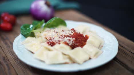 sorrentinos with tomato sauce on a plate