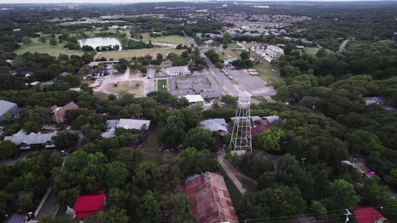 drone circles downtown city's water tower and surrounding area