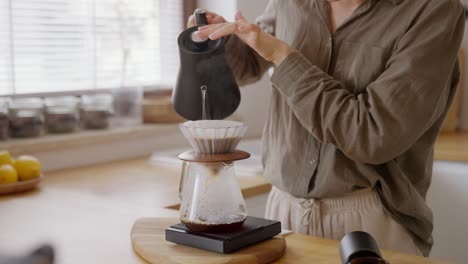 pouring coffee with a pour over method