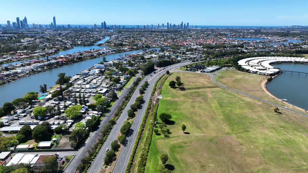 Experience stunning drone footage of Gold Coast's Emerald Lakes, Surfers Paradise skyline, and vibrant cityscape, capturing the breathtaking beauty and lively atmosphere from above.