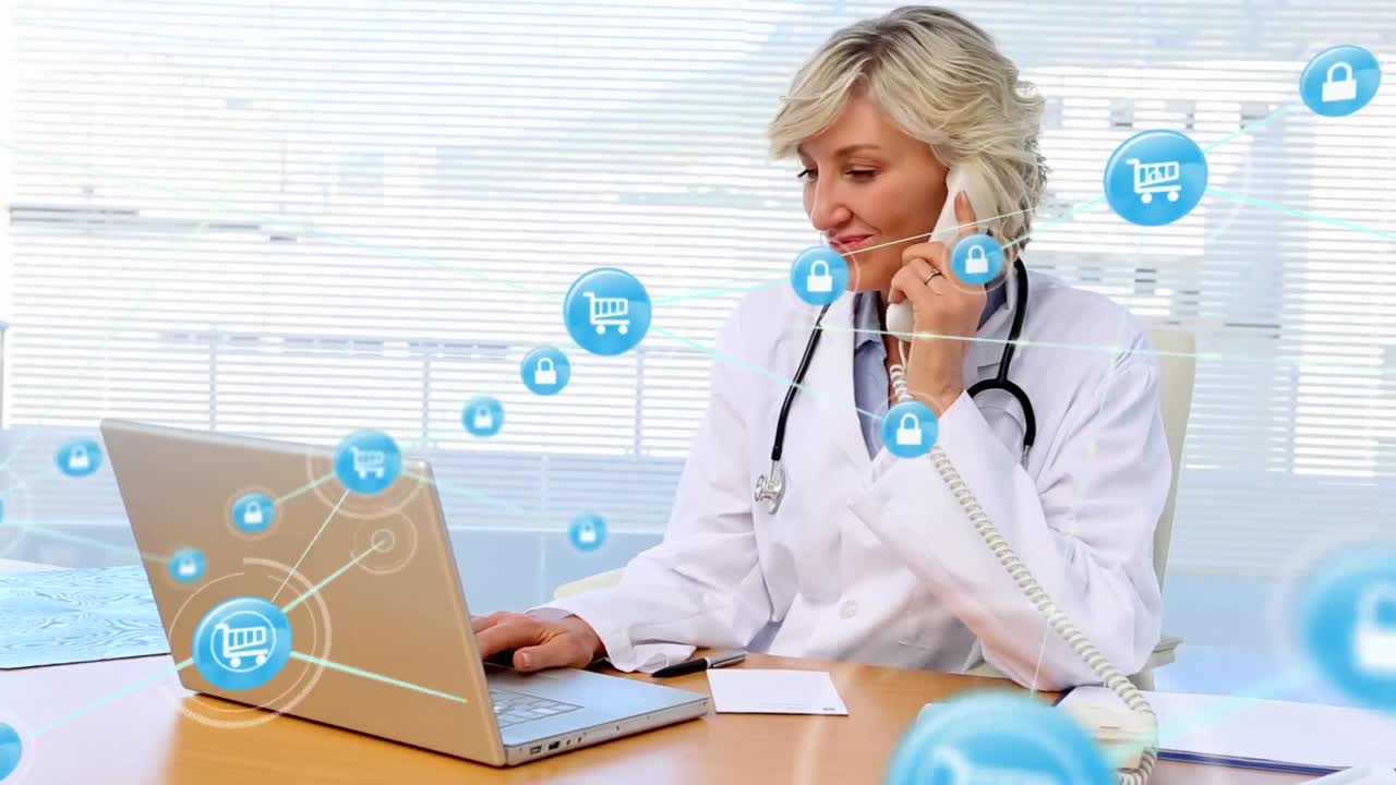 Animacja połączonych ikon nad białym lekarzem pracującym na laptopie podczas rozmowy przez telefon komórkowy.