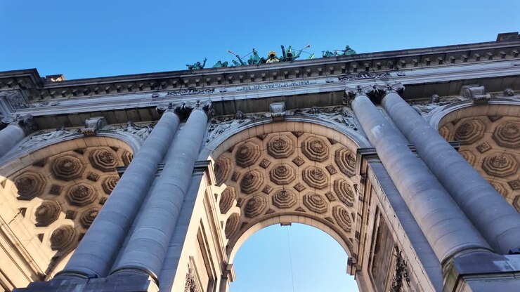 Low-angle view of Cinquantenaire Arch in Brussels, Belgium