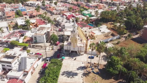 aerial of small church in sunny mexico