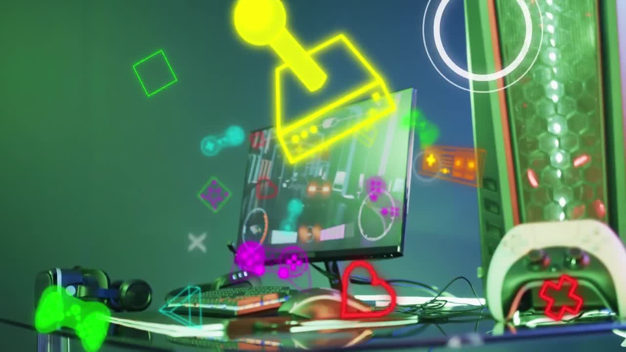 Animation of neon icons over video game computer equipment