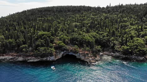 cypresses and olive trees on the rugged ionian sea coast
