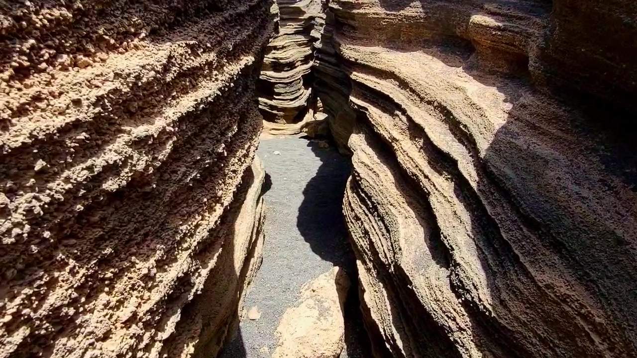 The Lanzarote Cracks. Walking between the cracks of the eroded volcanic landscape. Lanzarote. Canary Islands.