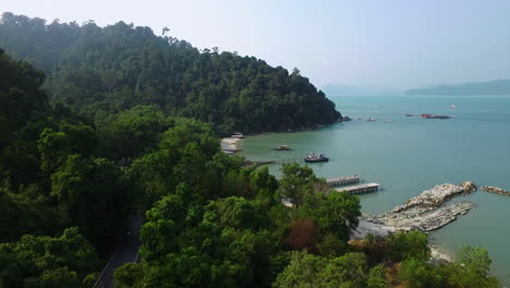 Aerial-Of-Bay-with-Small-Fishing-Boat-in-Tropical-Island