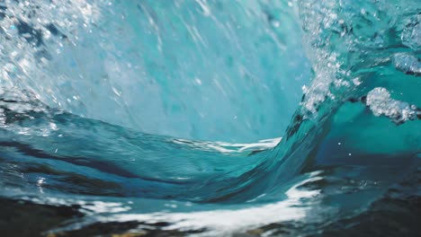 a dramatic scene of a powerful torrent of turquoise transparent water flowing and whirling