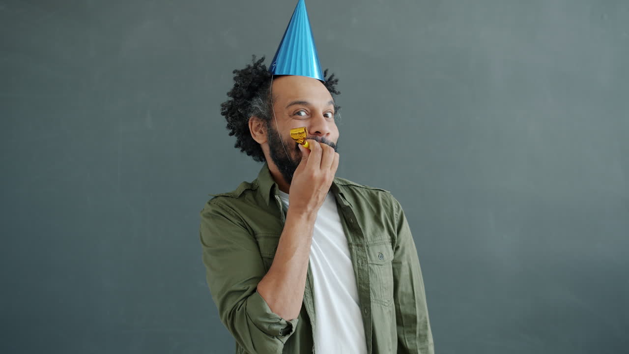 Man with Party Hat and Horn