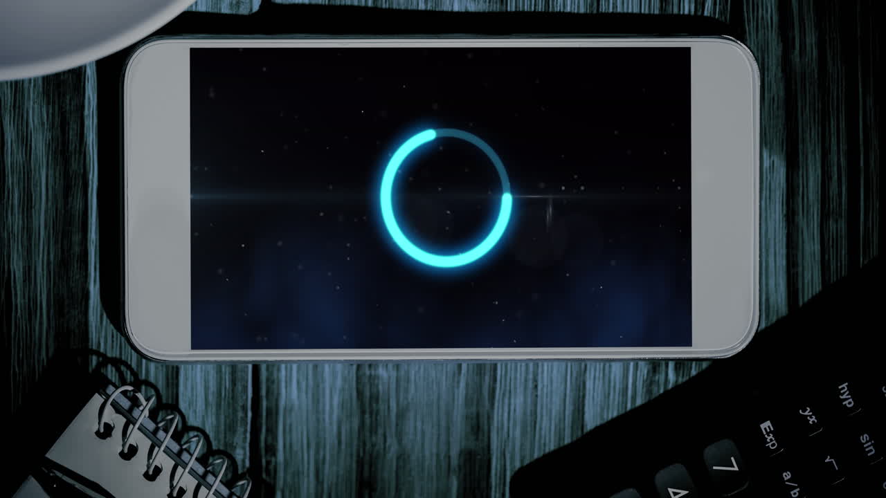 스마트폰 화면에 로딩 아이콘으로 데이터 처리의 애니메이션