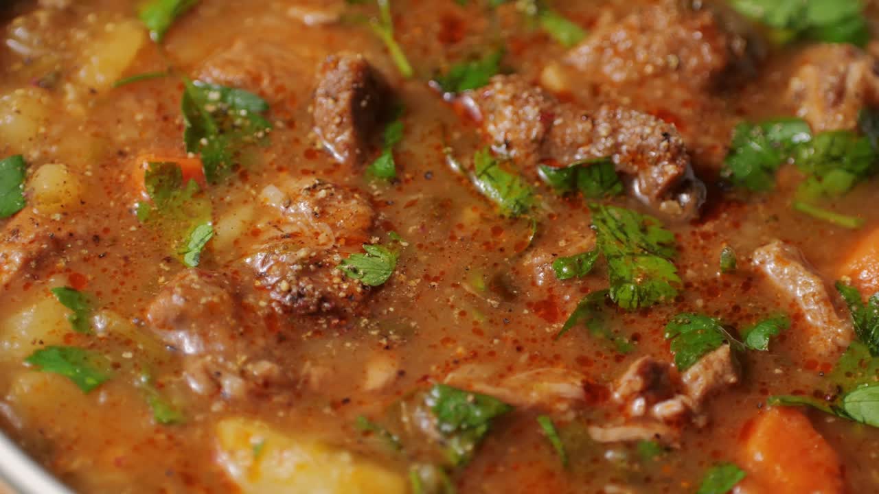 Hungarian goulash soup bograch close-up on the table. horizontal . High quality 4k footage