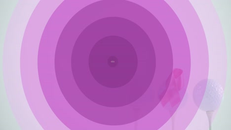 animación de círculos púrpuras y concienciación sobre el cáncer de mama sobre las pelotas de golf
