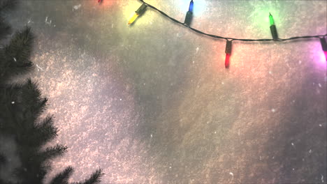 Animated closeup colorful garland and Christmas green tree branches 2