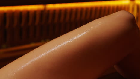 person's arm in a sauna