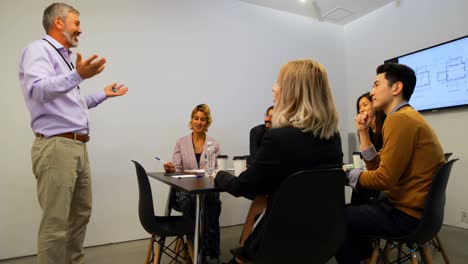 businessman giving presentation in conference room 4k