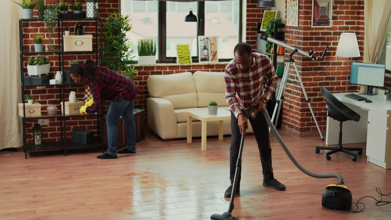 African american couple doing housework and chores