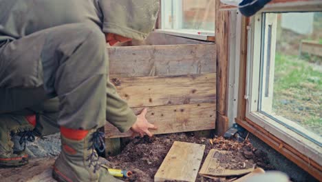 Man Building Wooden Box For Planting Plants - Close Up