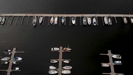 small pleasure boats anchored in the yacht port in dabie lake in szczecin, poland