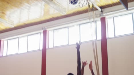 Basketball-players-playing-in-the-court