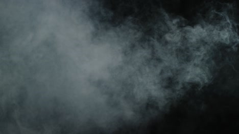 realistic smoke / fog / gas moving fast with gust of wind, filling black background. real lens flare that is easy to use in blend / overlay modes.