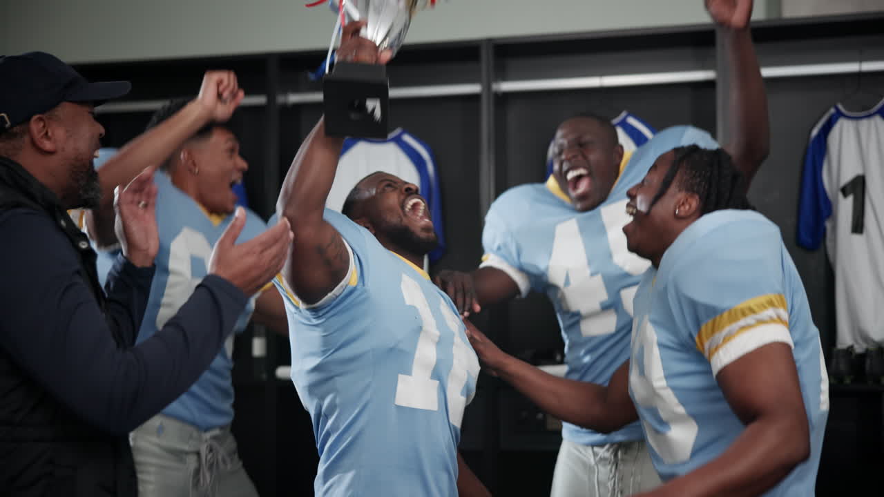 Football Team Celebrates Victory in Locker Room