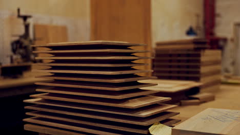 stacks of wooden boards in a workshop