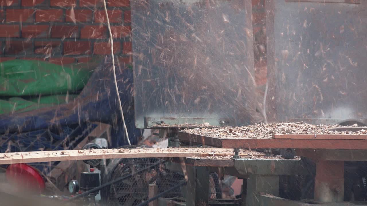 Medium Exterior Shot of Wood Cutter Machine