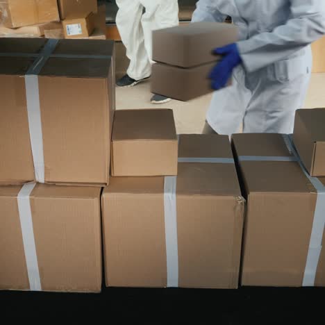 Staff-Unload-Boxes-Of-Medicines