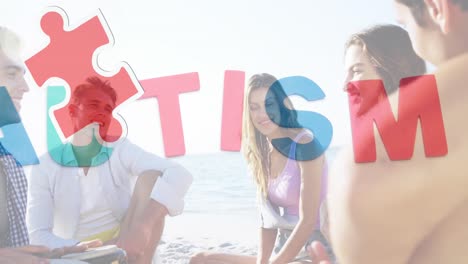Animation-of-colourful-puzzle-pieces-and-autism-text-over-happy-friends-at-summer-beach-party
