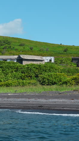 abandoned buildings on a remote island beach