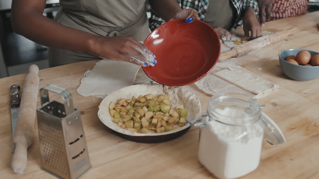 African American Family Making Apple Pie