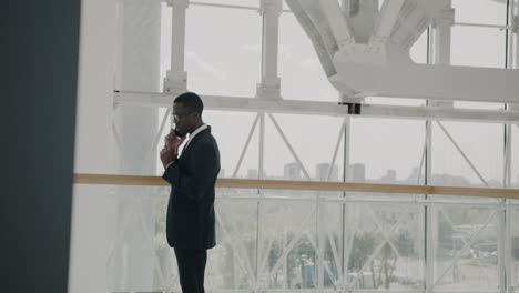 businessman on phone in modern office building