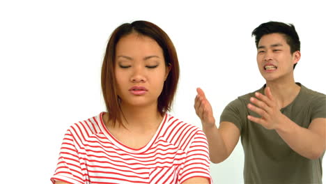 asian couple having argument