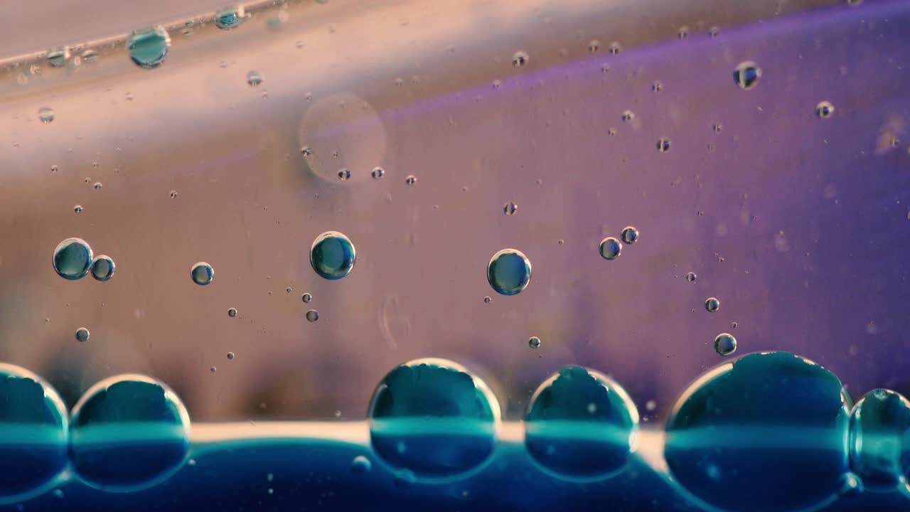 Blue Substance with Chemical Bubbles Macro Abstract
