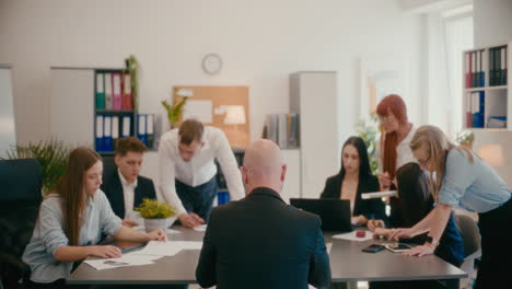 manager with employees working in office.