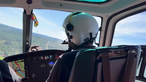 pilot's view from a helicopter cockpit during flight