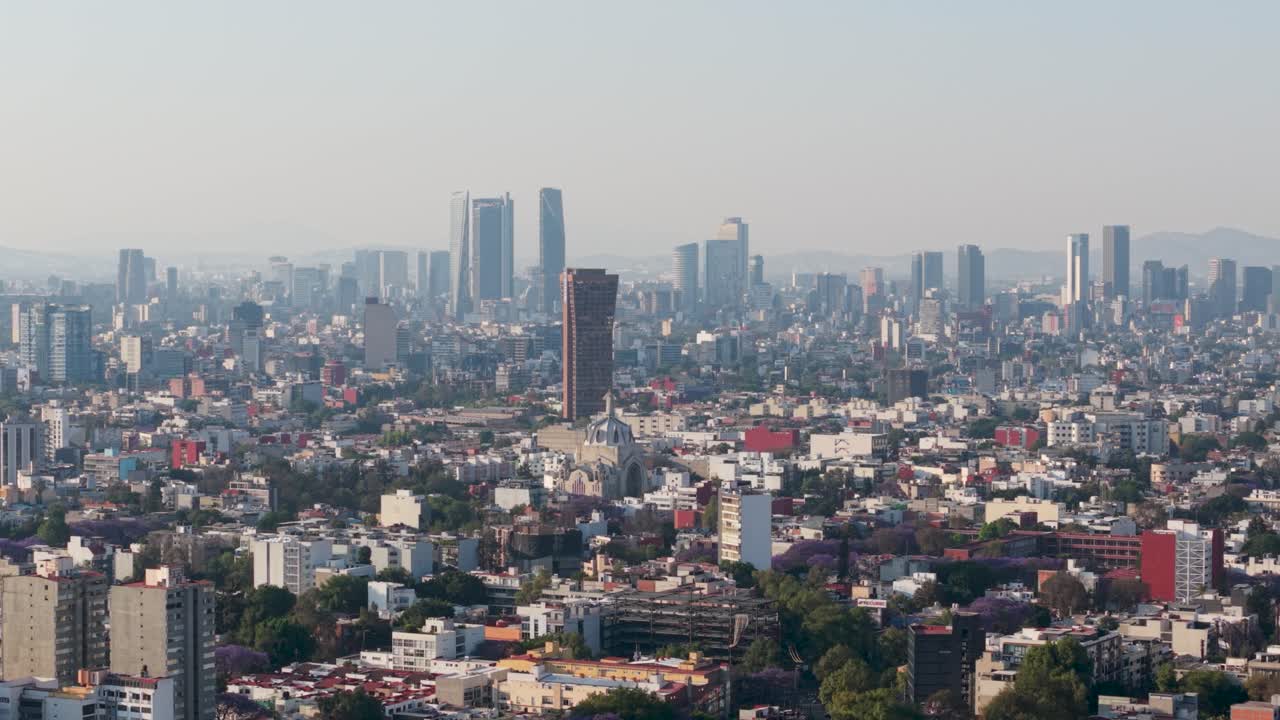 Smoggy day telephoto aerial view of Mexico City
