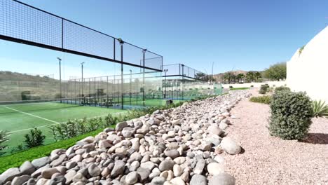 low dolly shot revealing the new state-of-the-art outdoor padel court facilities