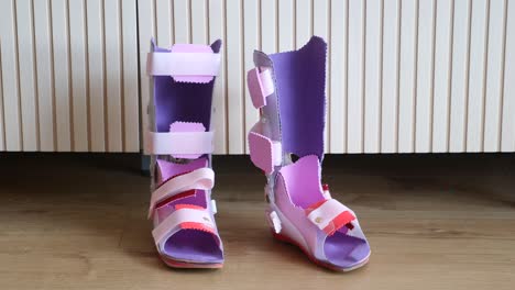 childrens purple and pink leg brace