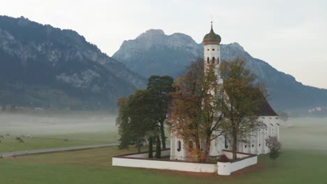 neuschwanstein church misty morning in autumn | 4k | dji mavic 2 pro d-log - perfect for colour grading