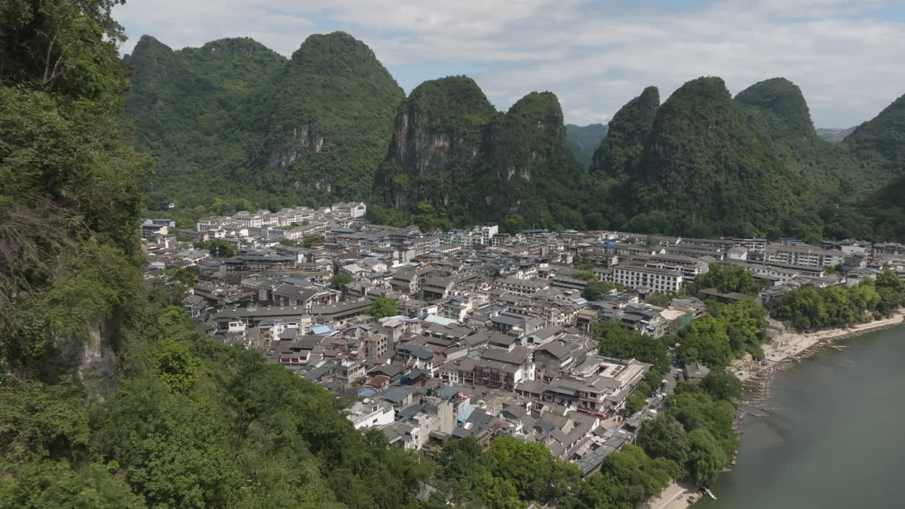 Aerial view revealing the Yangshou village, sunny, summer day in Guangxi, China