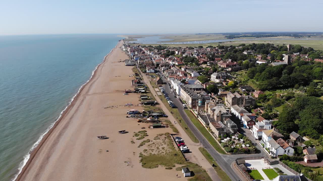 Revealing drone shot showing the sea front at Aldeburgh, Suffolk, UK. 21.06.25