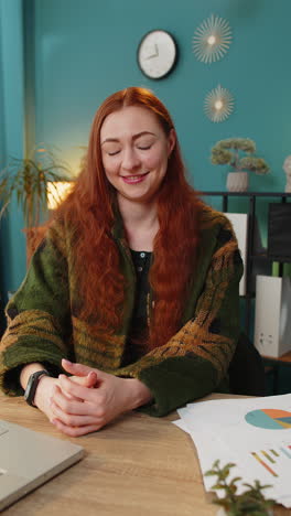 caucasian woman smiling pointing to camera choosing lucky winner indicating inviting approve at home