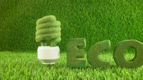 Eco-light-bulb-in-green-grass.-Eco-concept-background