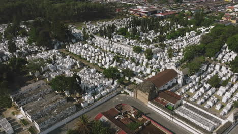 slow aerial flyover of a white cemetery in antigua, guatemala