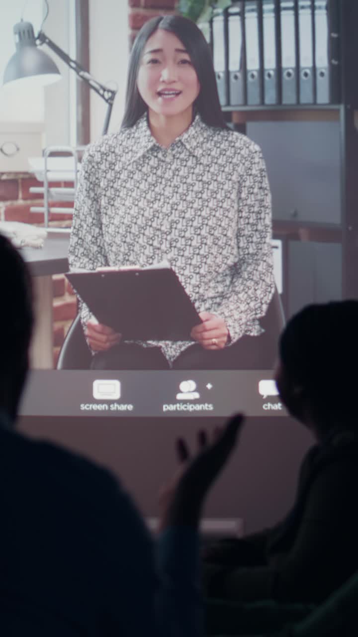 Vertical Video Diverse company staff joining a video call online with the CEO late at night