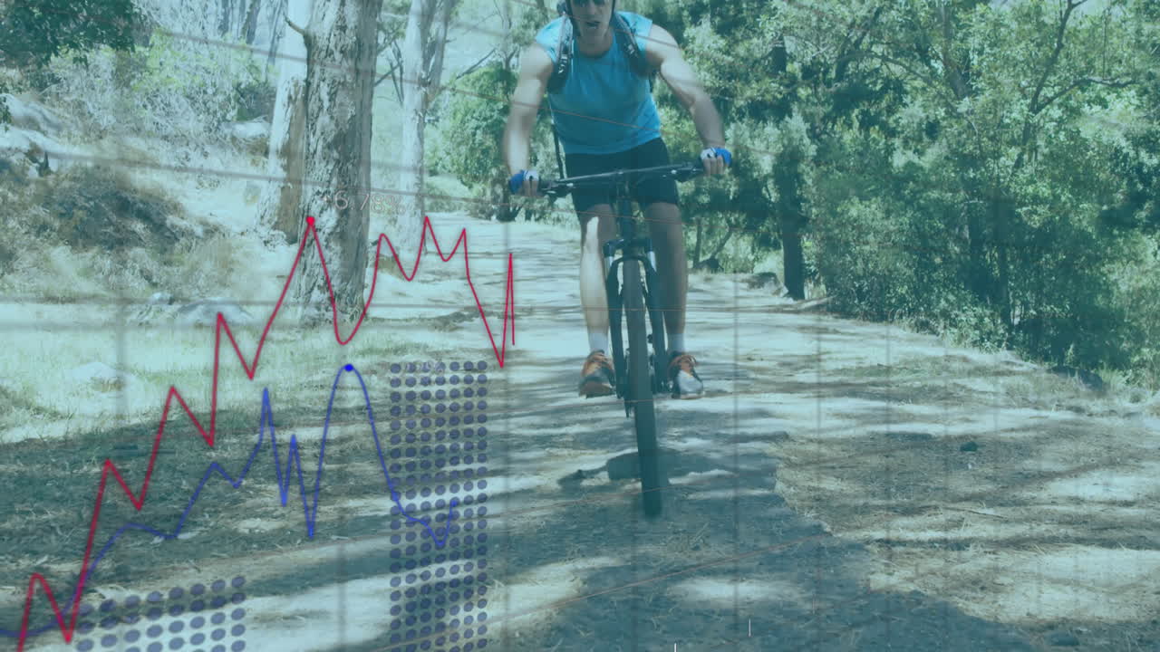 Man riding mountain bike on forest trail, showing red blue line graphs, dotted sports tech overlay